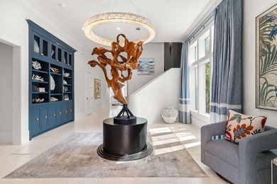Set within the gated community of Paradise by the Sea, this - photo 6
