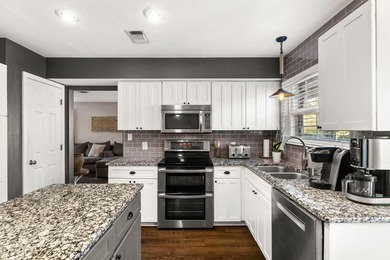 WATERFRONT Home! CONVENIENTLY located just minutes from the - photo 18
