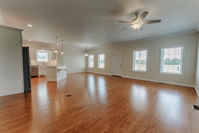 Own one-or both-of these beautifully designed ranch townhome