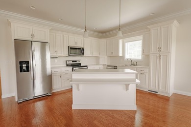 Own one-or both-of these beautifully designed ranch townhome