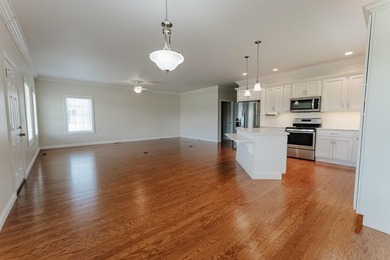 Own one-or both-of these beautifully designed ranch townhome