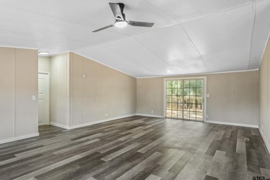 Welcome to this beautifully updated 4-bedroom, 2-bathroom mobile - photo 6