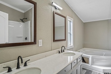 Welcome to this beautifully updated 4-bedroom, 2-bathroom mobile - photo 9