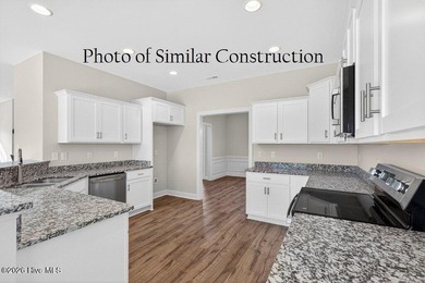 The ''Bailey'' floor plan is under construction in the Hutton - photo 12