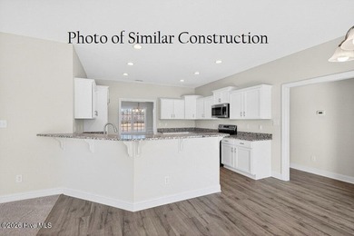 The ''Bailey'' floor plan is under construction in the Hutton - photo 13