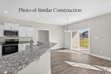The ''Bailey'' floor plan is under construction in the Hutton - photo 14