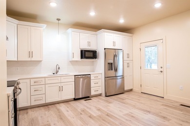 Luxury condominium located on Cooper's Hawk Golf Course