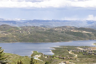 Nestled in the exclusive gated community of Deer Crest, this - photo 8