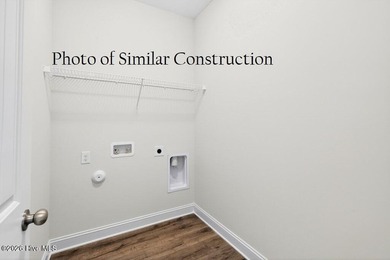 The ''Bailey'' floor plan is under construction in the Hutton - photo 23