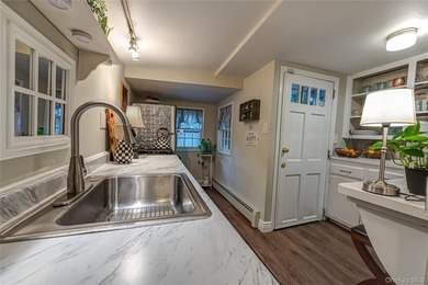 Charming circa 1918 ranch nestled on a .16-acre property in - photo 9