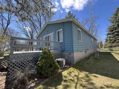 Charming Saginaw Bay Ranch with 50 Feet of Waterfront Frontage! - photo 1