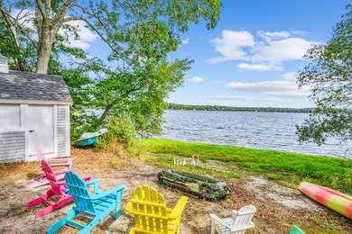 Awaken to the gentle shimmer of Lake Wequaquet, one of Cape - photo 10