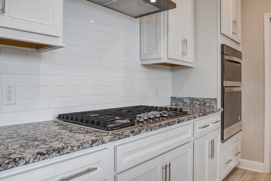 Priced to sell at $450,000, this beautifully maintained home at