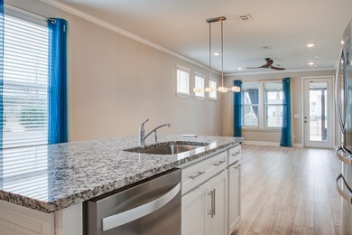 Priced to sell at $450,000, this beautifully maintained home at