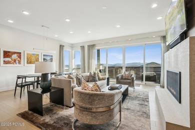 Enjoy this premiere location in Canyons Village with true ski-in - photo 3
