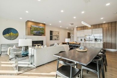 Enjoy this premiere location in Canyons Village with true ski-in - photo 9