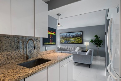 Relax in this fully furnished apt with new hurricane impact - photo 11