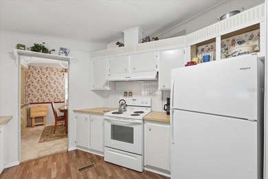 Welcome to this well-maintained 2-bedroom, 2-bath home located - photo 13