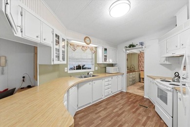 Welcome to this well-maintained 2-bedroom, 2-bath home located - photo 14