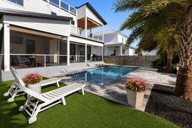 Welcome to 213 Pinetree Drive, a fully furnished contemporary - photo 1