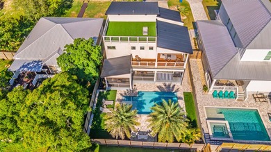 Welcome to 213 Pinetree Drive, a fully furnished contemporary - photo 2