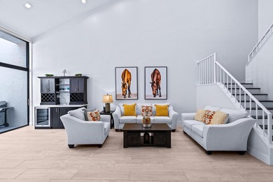 Explore an exceptional 3-bedroom plus den/bonus room, 4.5-bath - photo 2