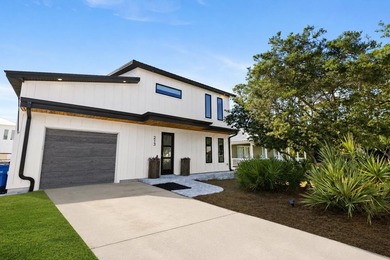Welcome to 213 Pinetree Drive, a fully furnished contemporary - photo 3