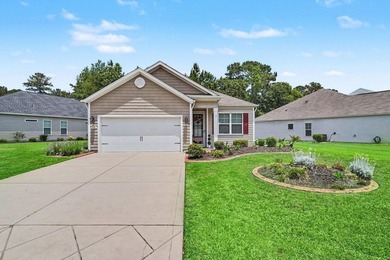 This well-designed three-bedroom, two-bathroom home features an - photo 1