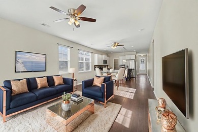 This well-designed three-bedroom, two-bathroom home features an - photo 2