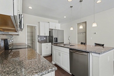 This well-designed three-bedroom, two-bathroom home features an - photo 8