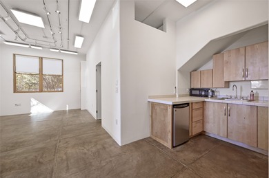 Discover this versatile live-work residence ideally located