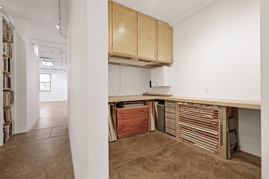 Discover this versatile live-work residence ideally located