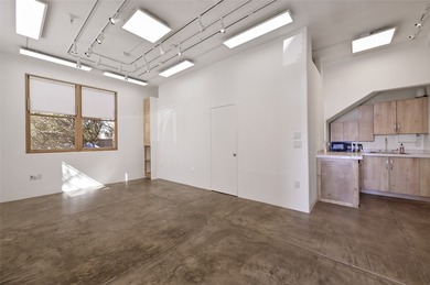 Discover this versatile live-work residence ideally located