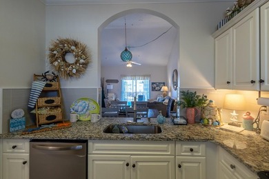 This well-maintained 2-bedroom, 2-bath condo offers a - photo 7