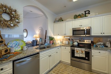This well-maintained 2-bedroom, 2-bath condo offers a - photo 8