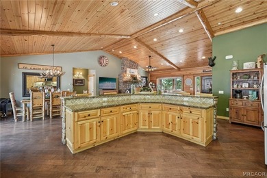 Majestic log-style mountain masterpiece located in the exclusive - photo 11