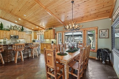 Majestic log-style mountain masterpiece located in the exclusive - photo 12