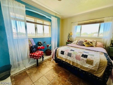 This SE Cape Coral Gulf-access, second-floor corner unit offers - photo 14