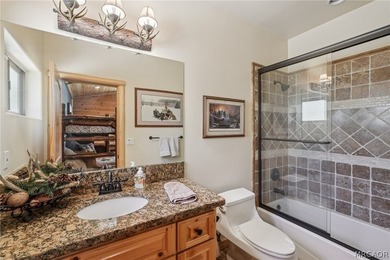 Majestic log-style mountain masterpiece located in the exclusive - photo 17