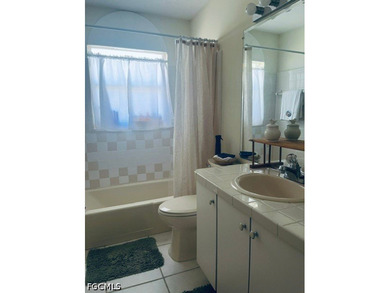 This SE Cape Coral Gulf-access, second-floor corner unit offers - photo 21