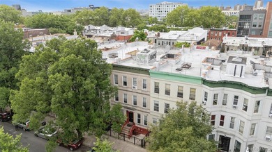 198 Hull Street is a six-family brick multifamily property - photo 2