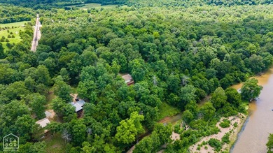 Experience direct Spring River frontage on 3.05 acres located on - photo 26