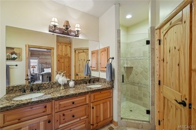 Majestic log-style mountain masterpiece located in the exclusive - photo 29