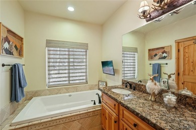 Majestic log-style mountain masterpiece located in the exclusive - photo 30