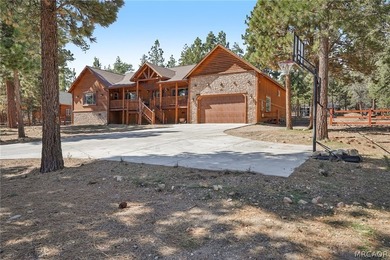 Majestic log-style mountain masterpiece located in the exclusive - photo 40