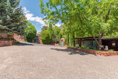 Set beneath the canopy of mature pines and just steps from the - photo 9
