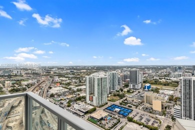 Welcome to Marquis Residence 4907, an oversized two-bedroom sky