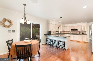 Tucked away on five private acres with a stream that feeds into - photo 11