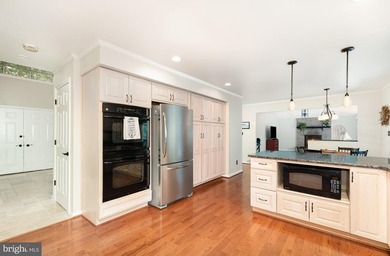 Tucked away on five private acres with a stream that feeds into - photo 12