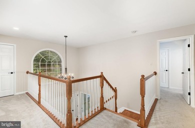 Tucked away on five private acres with a stream that feeds into - photo 18